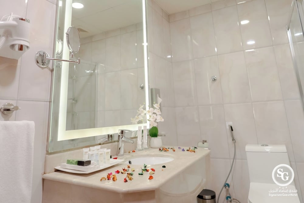 Фото Signature Guest Hotel