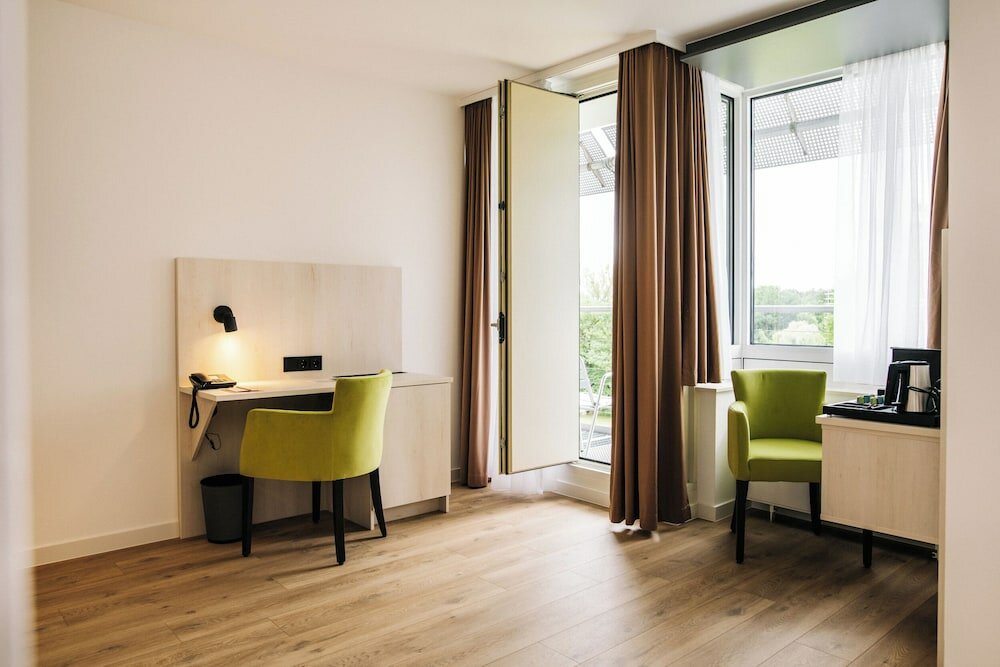 Фото Kongresshotel Potsdam am Templiner See