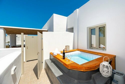 Гостиница Aerenia Luxury Suites в Картерадосе