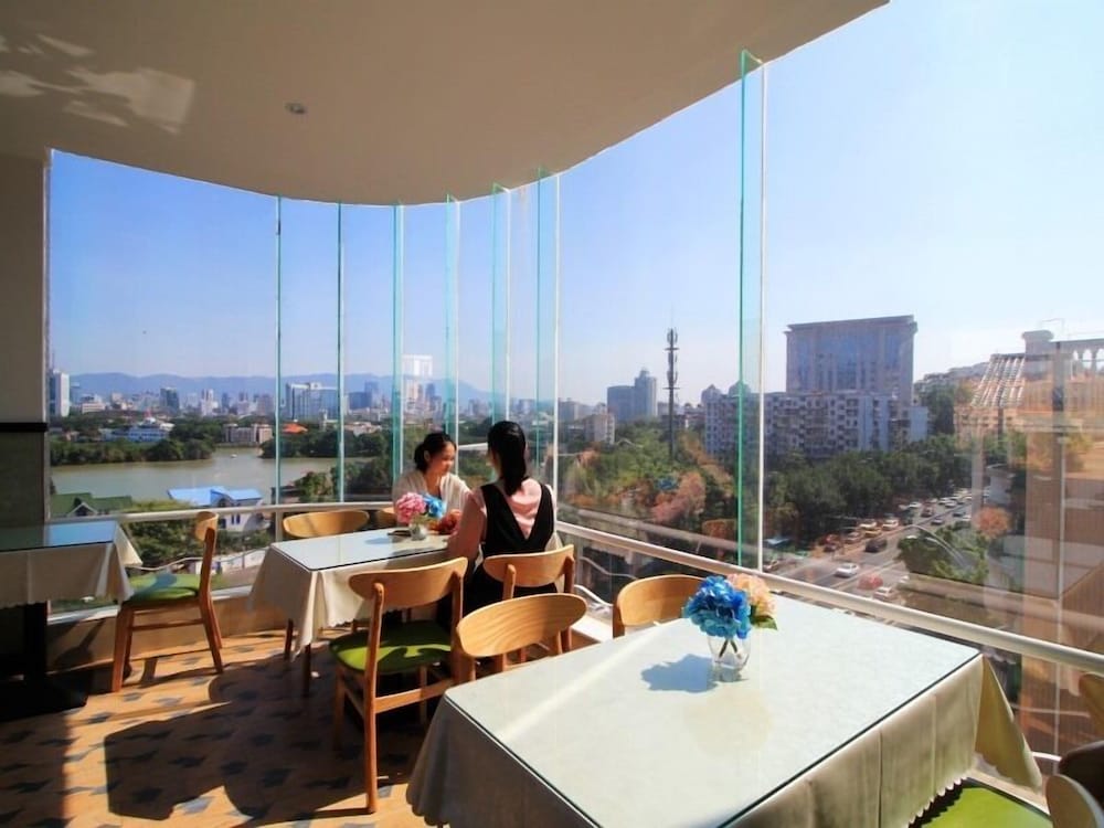 Фото GreenTree Inn Fuzhou Gushilou District North Xierhuan Road Zuohai park Express Hotel