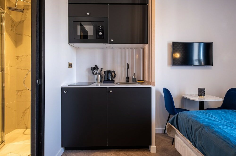 Фото Mijo's Appartements Hôtel