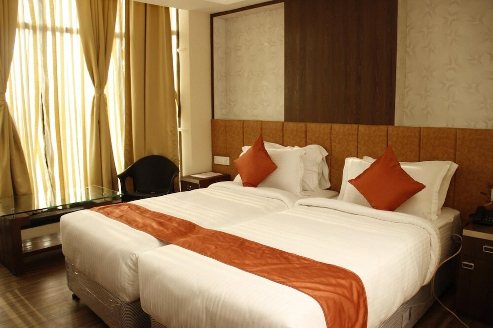 Фото Regenta Inn Larica