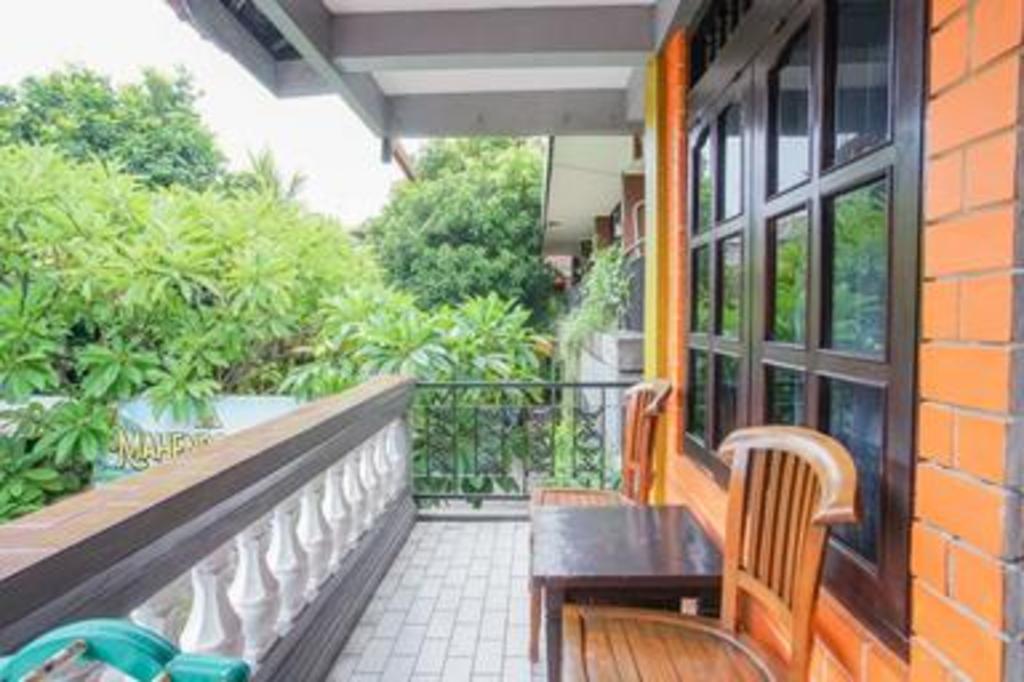 Фото Taman Mekar Beach Inn 2