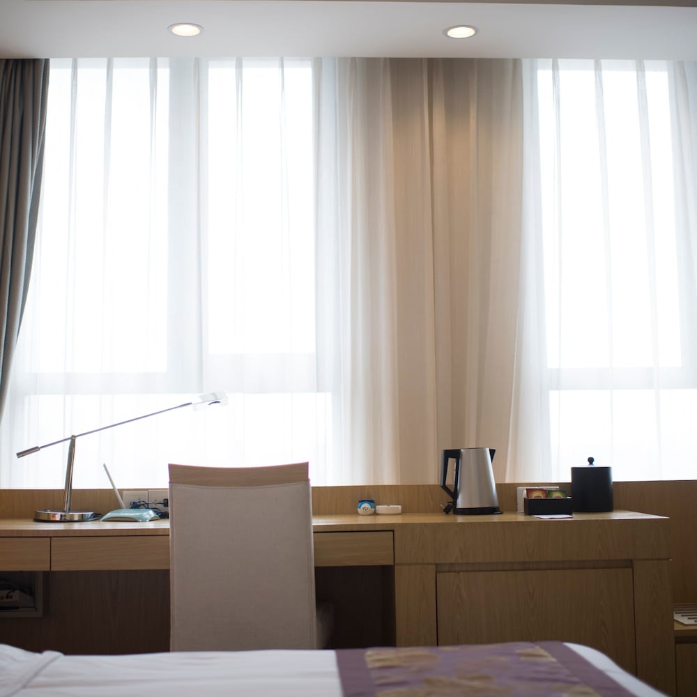 Фото Suzhou Sun Plaza Hotel