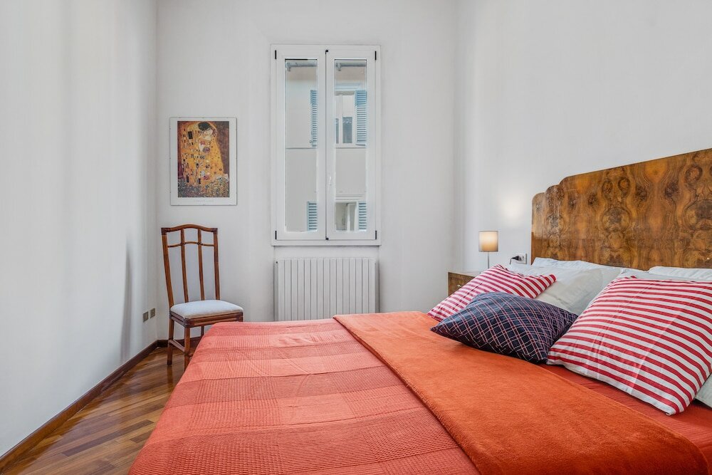 Фото A due passi dalla Pinacoteca Apartment