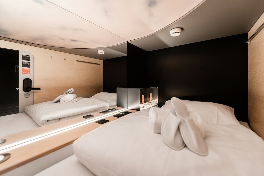 Фото Capsule Hotel - Alpine Garden Zurich Airport