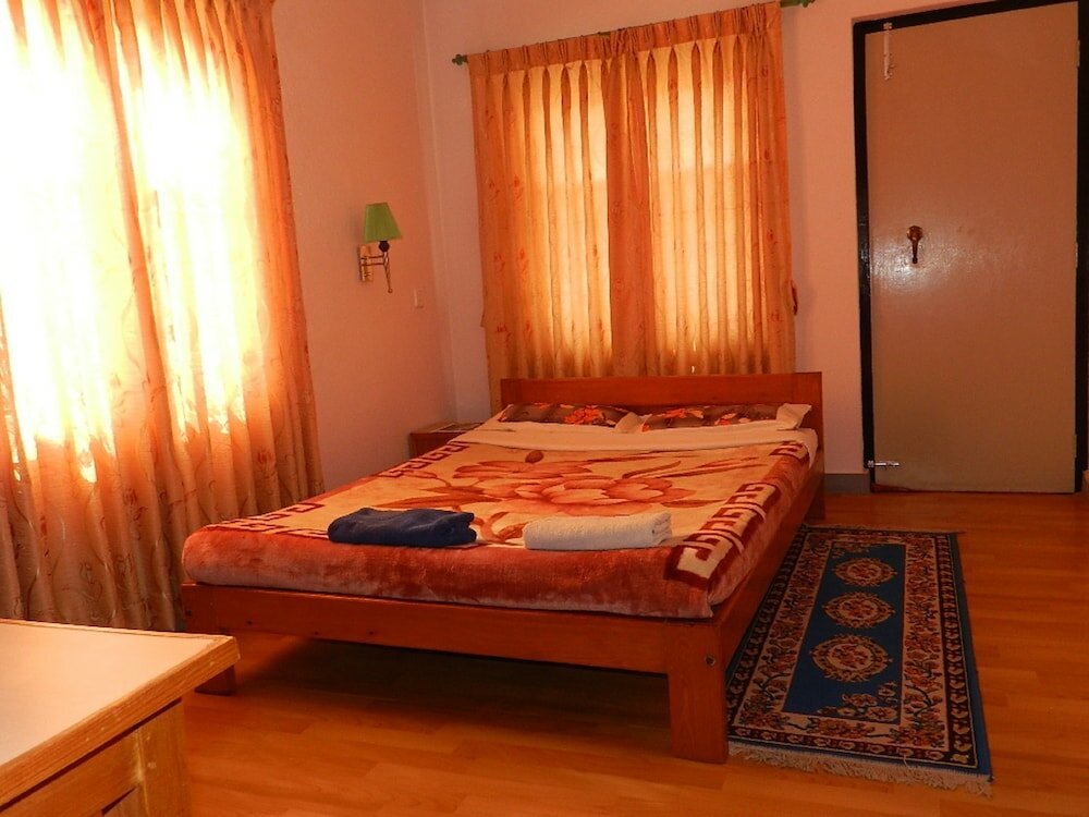 Фото Le Rhododendron Chambres D'hotes