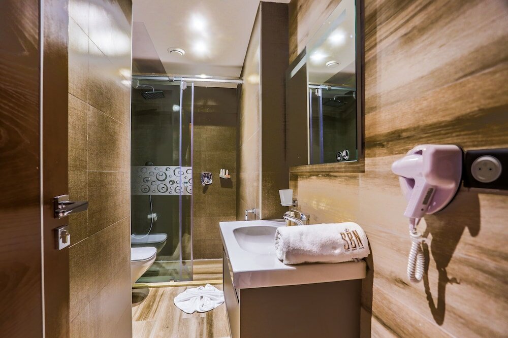 Фото Sbn Suites Hotel