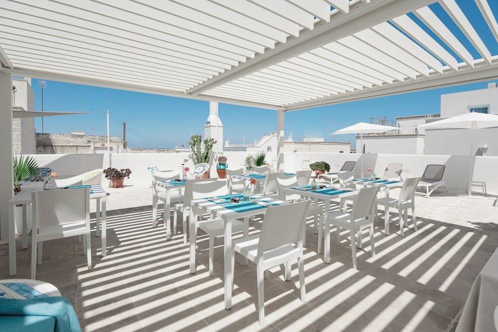 Фото Donna Domenica Boutique Suites