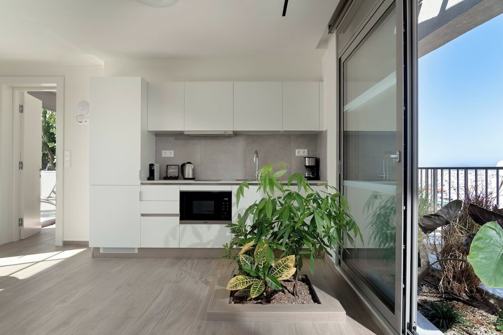 Фото Athens Hill Luxury Apartments