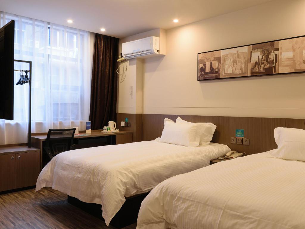 Фото Jinjiang Inn Style Xinyu Railway Station