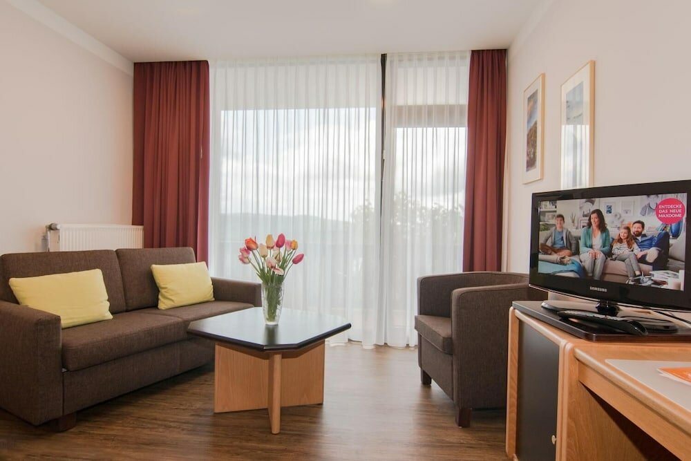 Фото Garni Hotel & Ferienwohnungen Seeschlößchen