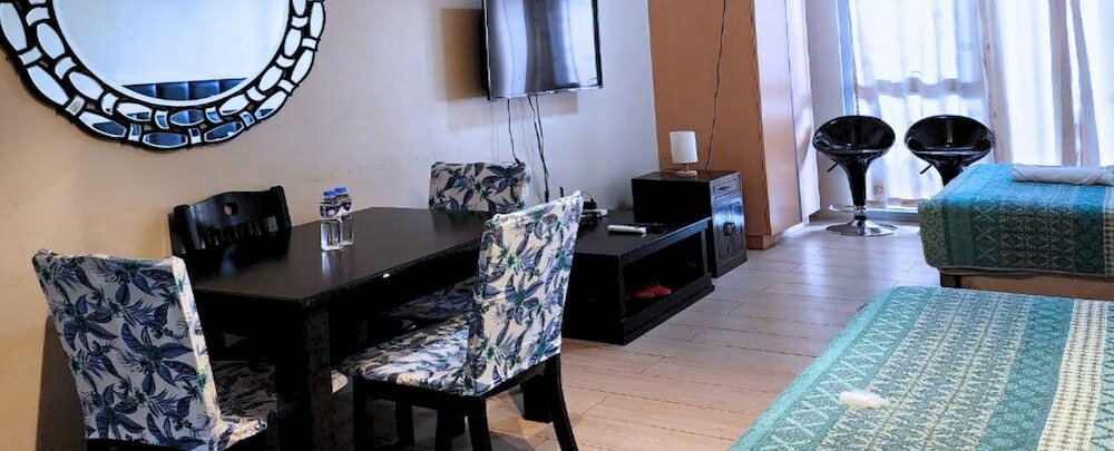 Фото Tess and Tessha Condotel near T3 Airport