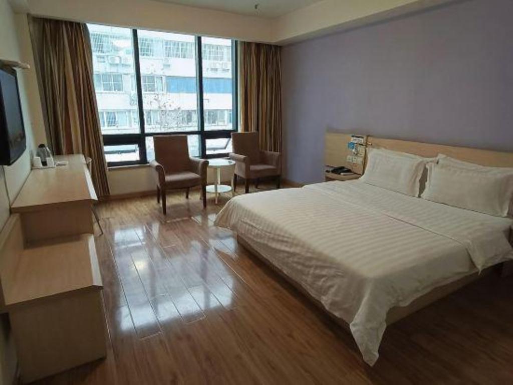 Фото 7Days Inn Chain Hotel Chongqing Wanzhou Gaosuntang Chongbai