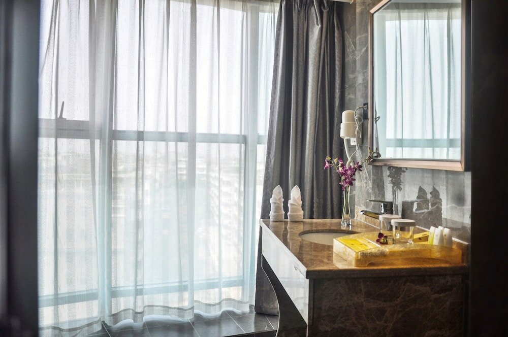 Фото Xiamen Hooray Hotel
