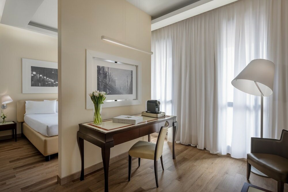 Фото UNAHOTELS Cusani Milano