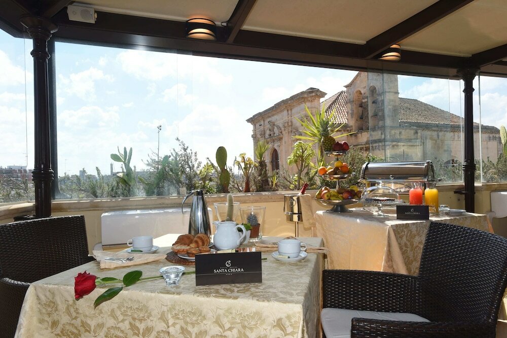 Фото Suite Hotel Santa Chiara