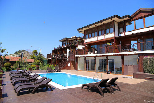 Гостиница Phellos Suites в Шиле