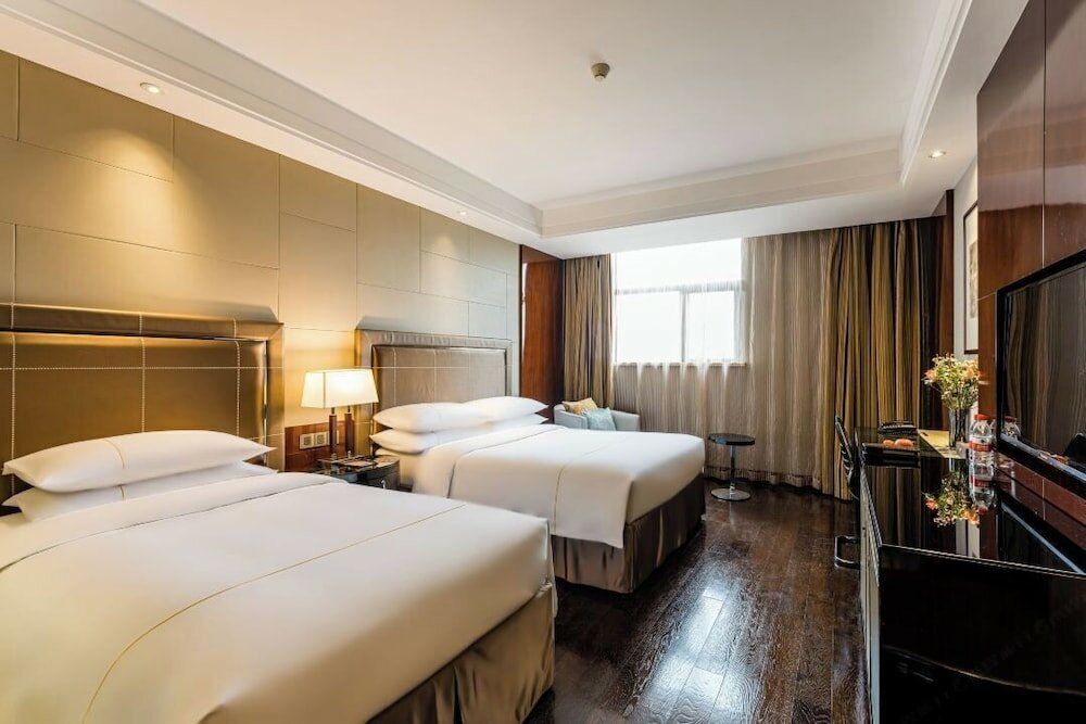 Фото Shanghai Maixinge International Hotel