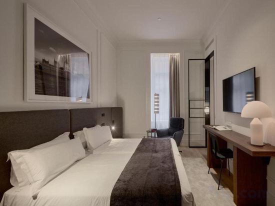 Фото Kozmo Hotel Suites & SPA