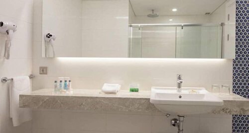 Гостиница Ramada Hotel & Suites by Wyndham Izmir Kemalpasa в Кемальпаше