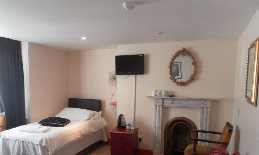 Фото The Old Palace Guest House