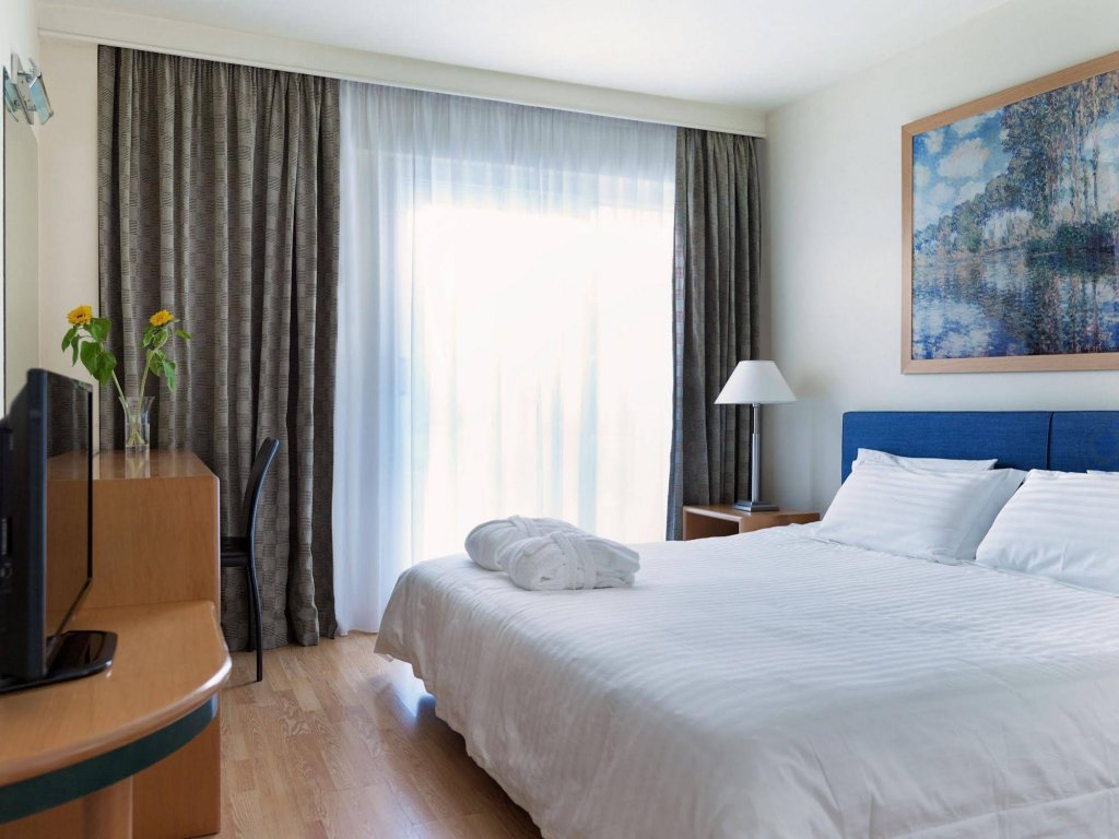 Фото Blazer Suites Hotel