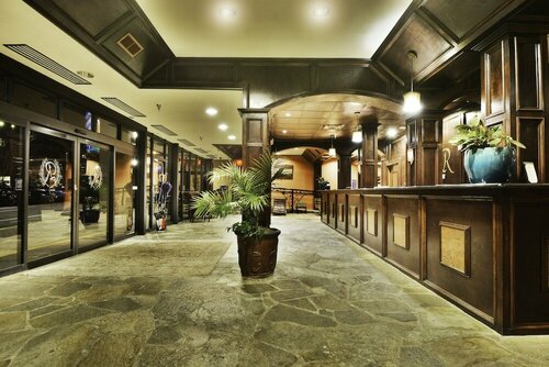 Гостиница The Remington Suite Hotel and SPA в Бошьер Сити