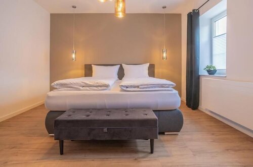 Гостиница Apartmenthaus Zur Quelle в Вернигероде