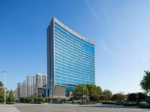Гостиница Rizhao Downtown в Жичжао