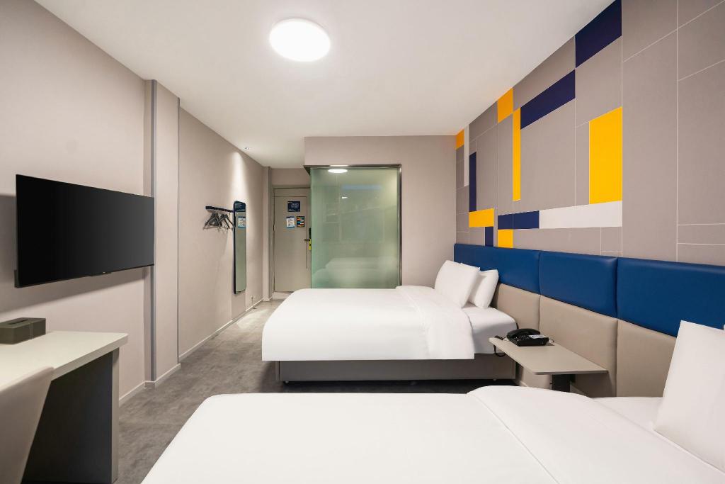 Фото 7Days Inn Shanghai LuJiaZui ShiMao Riviera GaRoaden