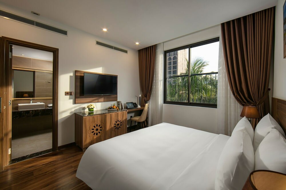 Фото Nesta Hotel Da Nang