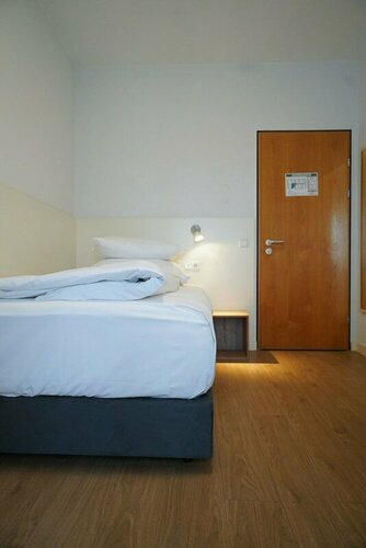 Гостиница Ap Hotel Viernheim am Kapellenberg в Фирнхайме