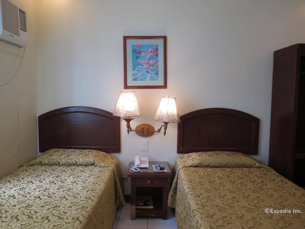 Фото Oyo 210 Apple Tree Suites