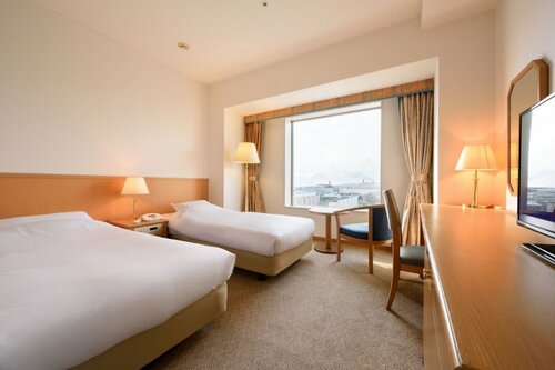 Гостиница Grand Hotel New Oji в Томакомае