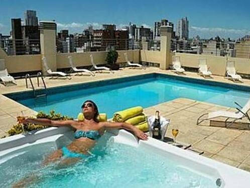 Гостиница Plaza Real Suites Hotel в Росарио