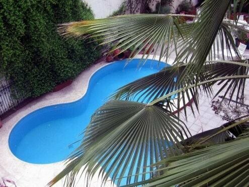 Внешний вид отеля Hotel Carollo в Мендосе, фото 5