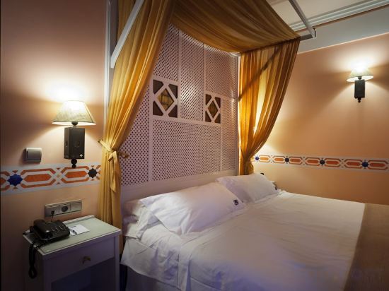 Фото Suites Gran VIA 44 Apartahotel
