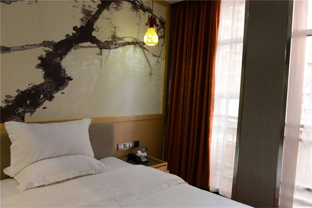 Фото Tai Xiang Business Inn