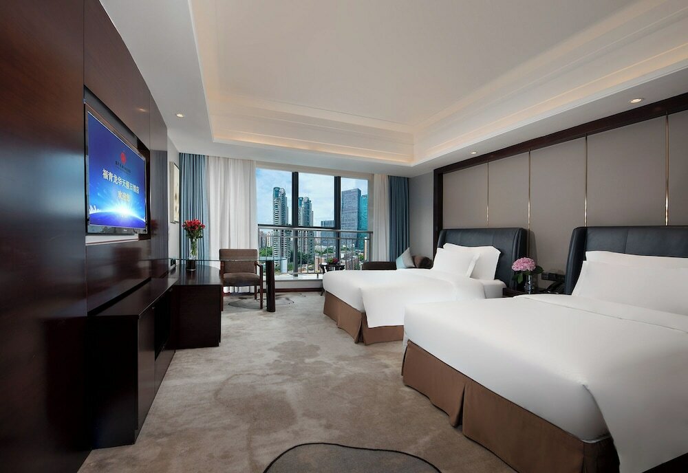Фото Fuqinglong Huatian Holiday Hotel