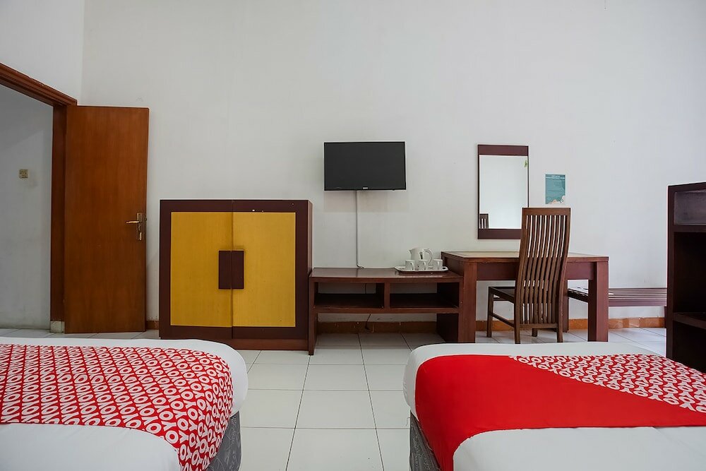 Фото Super Oyo 3406 Pandu Prima Guest House Syariah