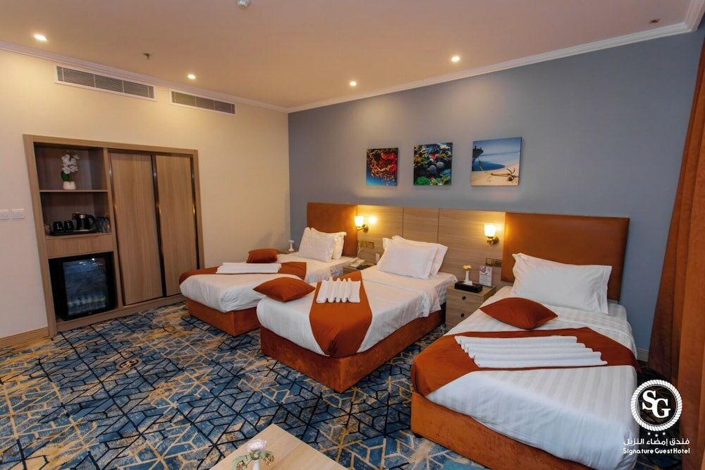 Фото Signature Guest Hotel