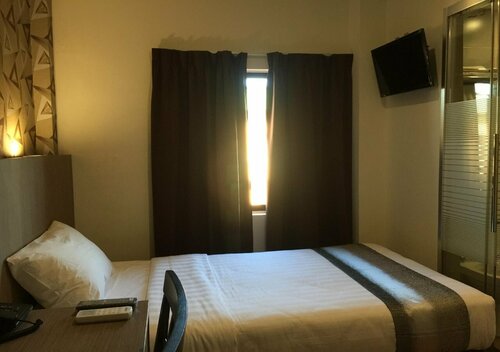 Гостиница Check Inn Hotel Tawau в Тавау