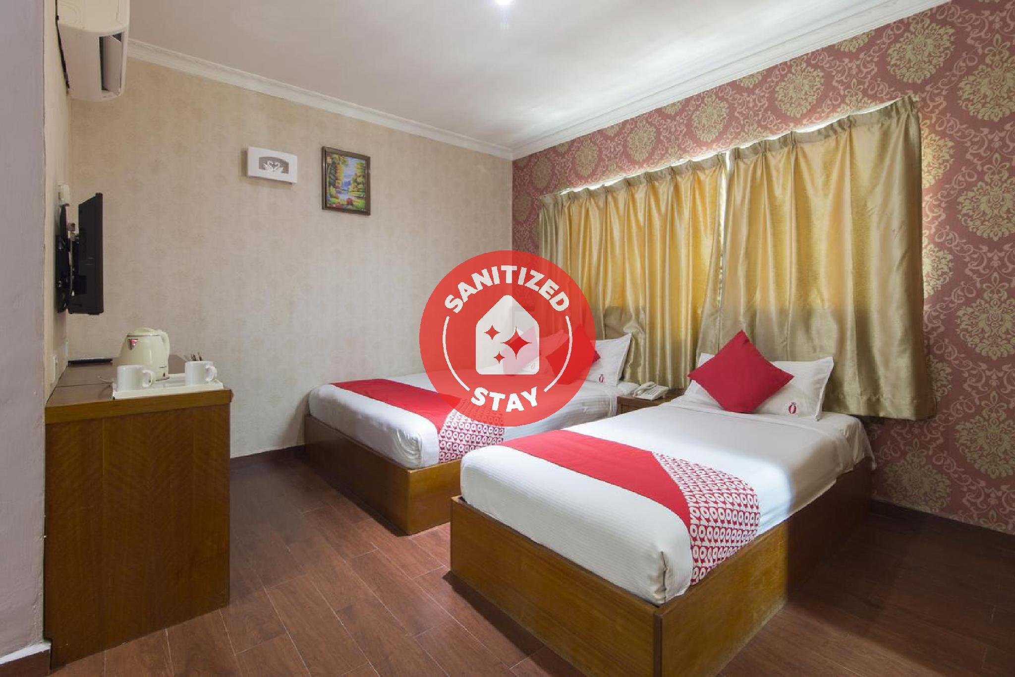 Фото Oyo 998 Queen City Hotel