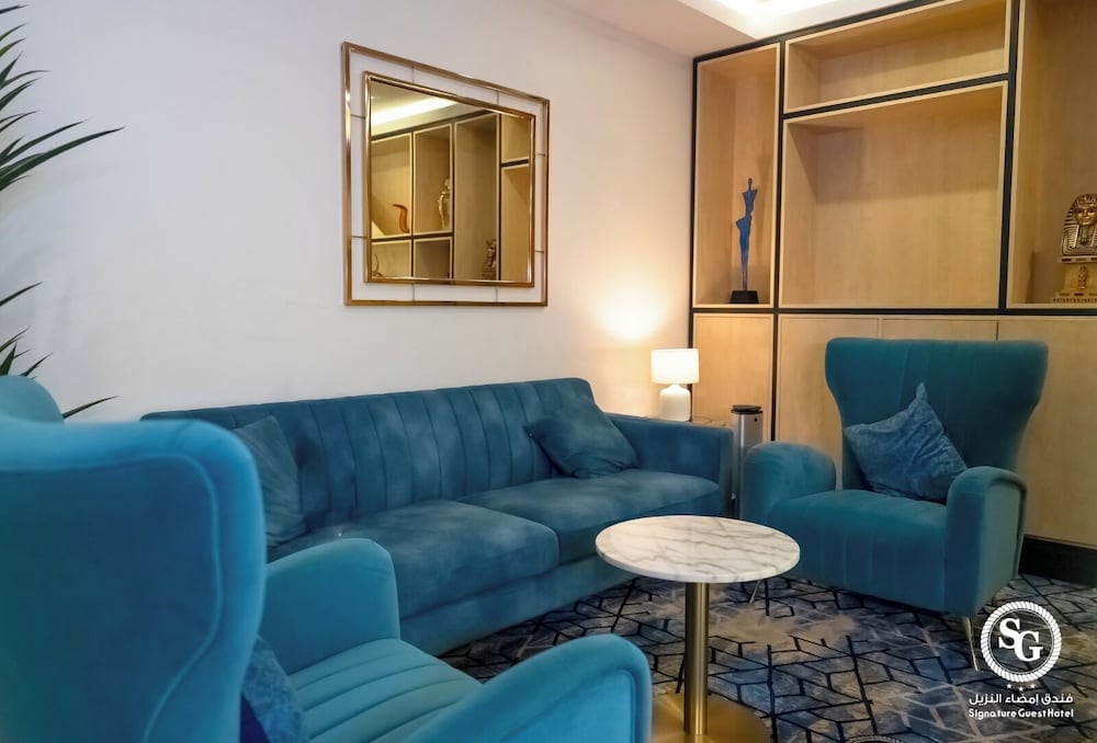 Фото Signature Guest Hotel