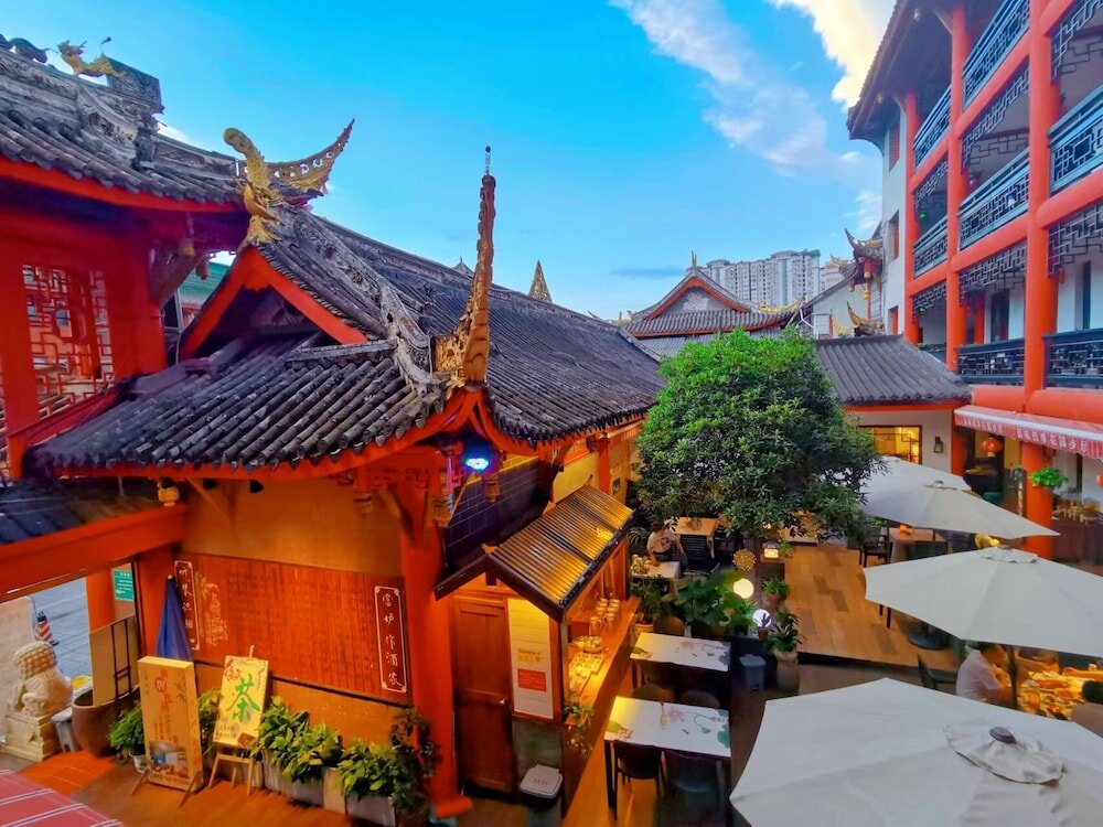 Фото Chengdu Wenjun courtyard Hotel
