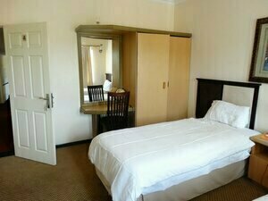 Гостиница Global Village Guesthouse в Манзини