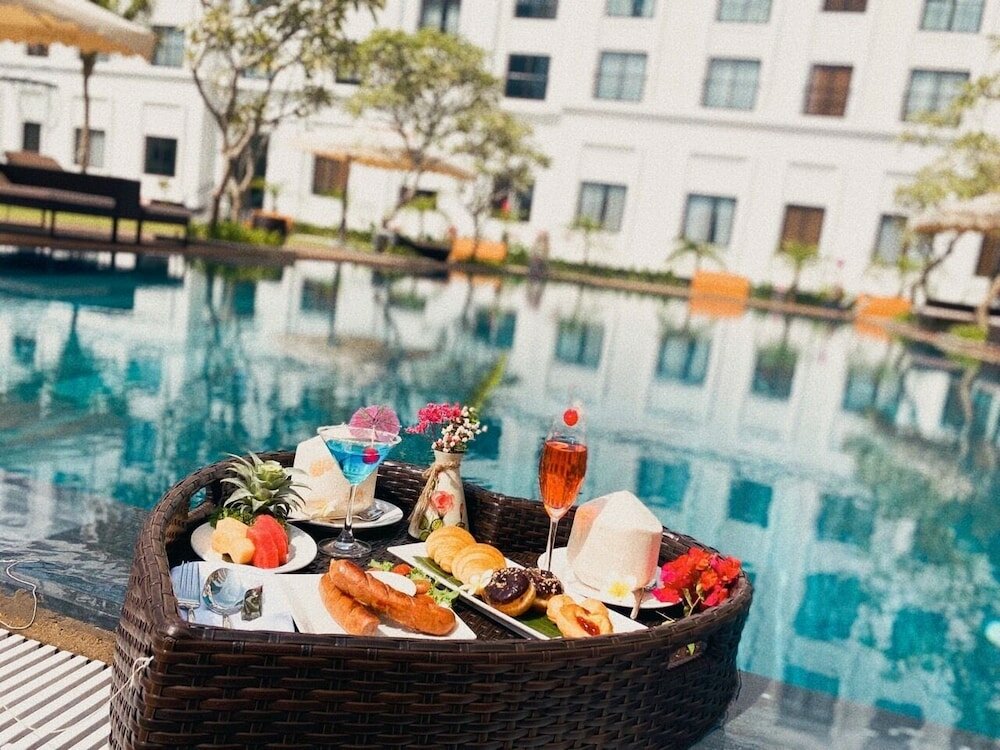 Фото Nesta Hotel Da Nang