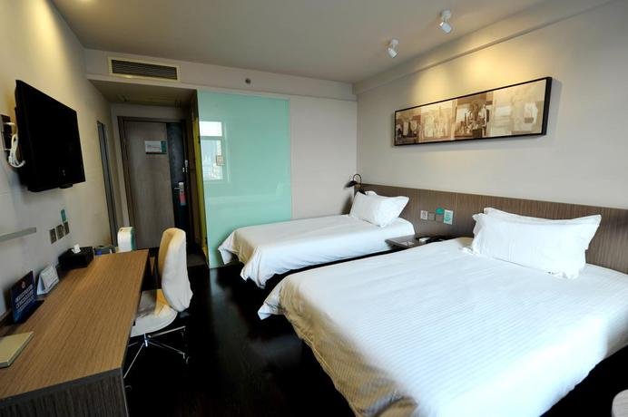 Фото Magnotel Hotel Beijing West Railway Station