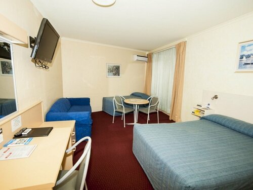 Гостиница Palm Court Motor Inn в Порт Маккуори